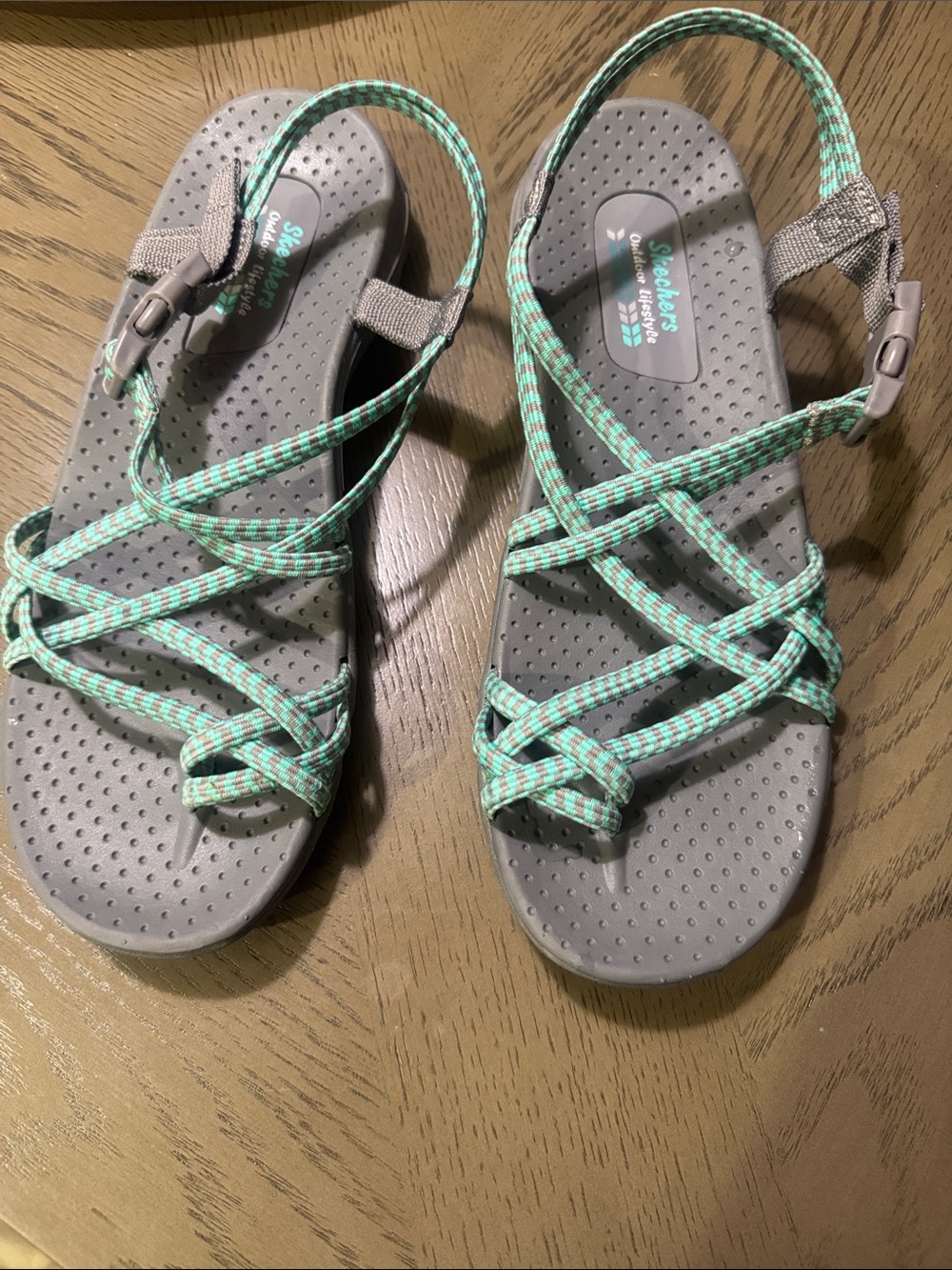 Skechers women’s size 11 
Gray Sandals with Mint Strappy Cords